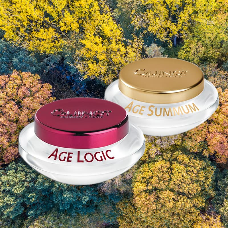 Longevity Skincare products in front of beautiful autumnal trees